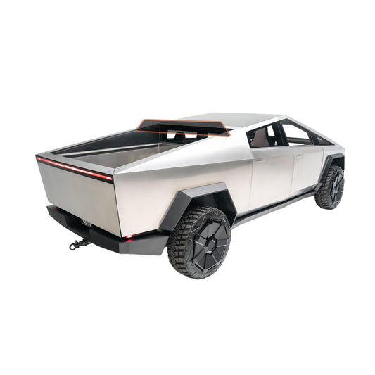 A silver aluminum truck with a spacious bed, showcasing its sturdy design and functionality.

